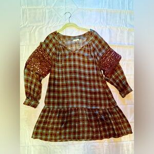 Brown plaid ruffle hem dress with crochet detail sleeves